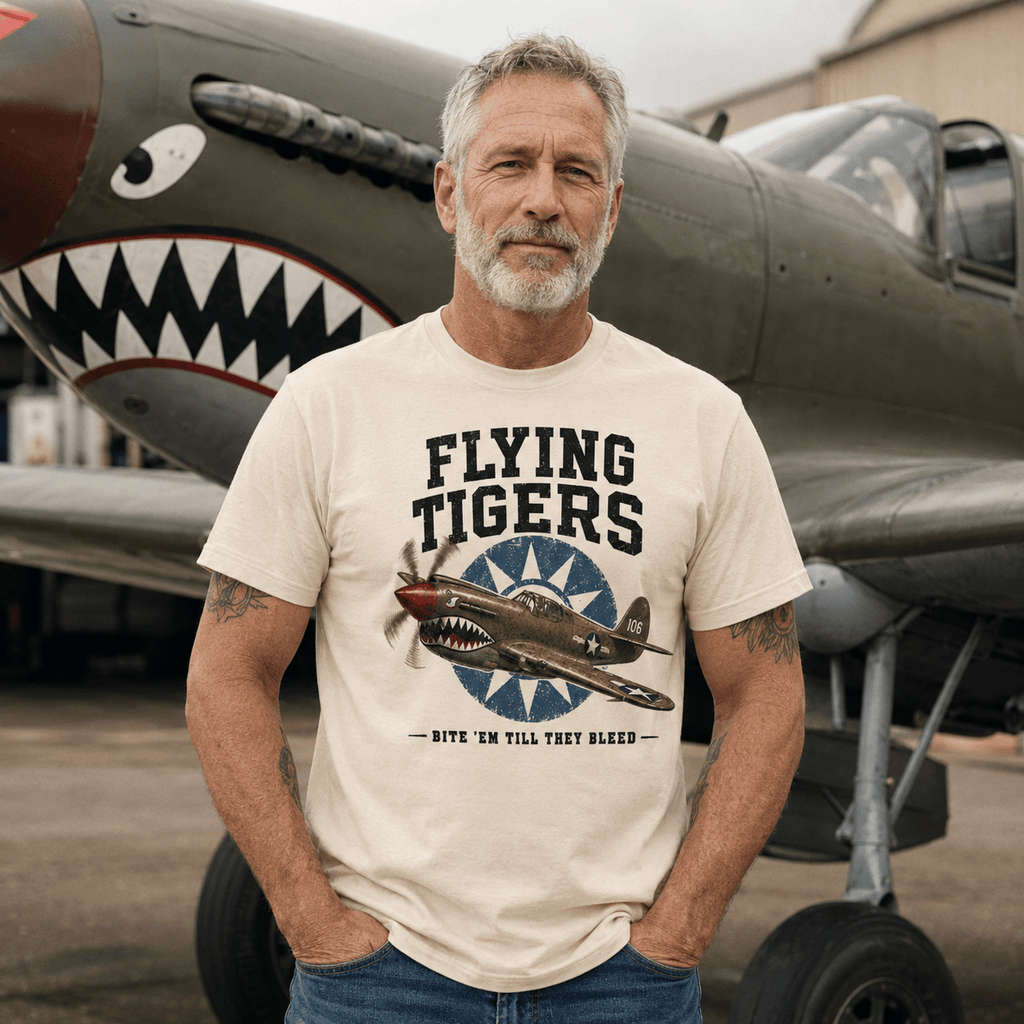 Man wearing the cream Veteran Shirts Flying Tigers Airplane Shirt beside a shark-mouth aircraft